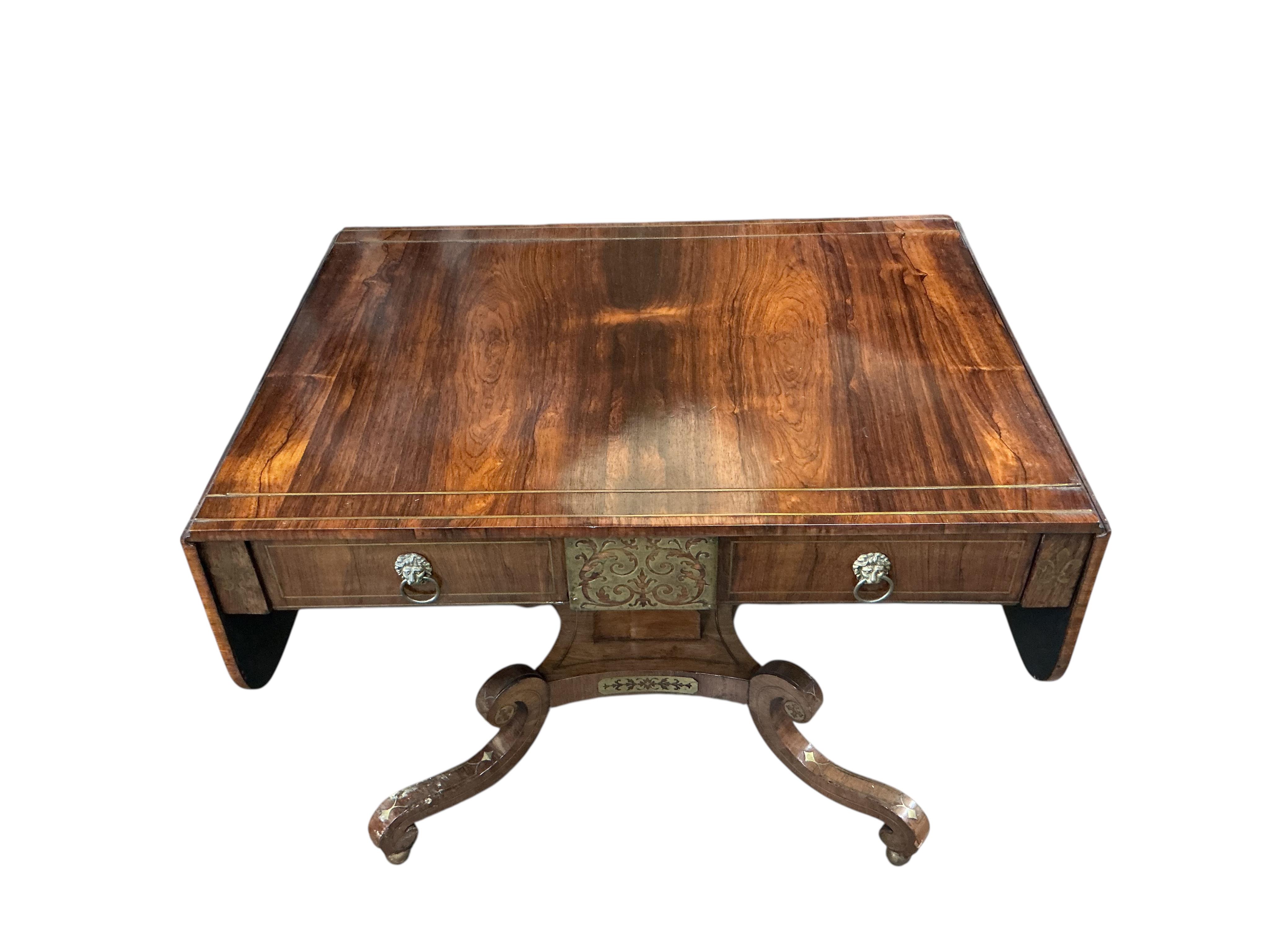 A Regency brass mounted rosewood sofa table, width 91cm, depth 66cm, height 70cm